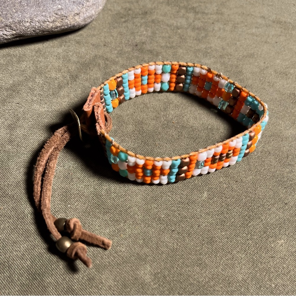 Beaded adjustable cuff bracelet. Suede laces